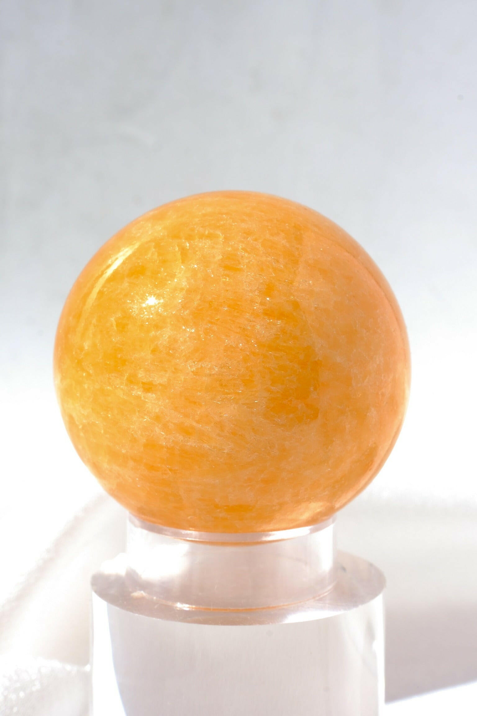 Mexican Orange Calcite Sphere Healing Crystal.