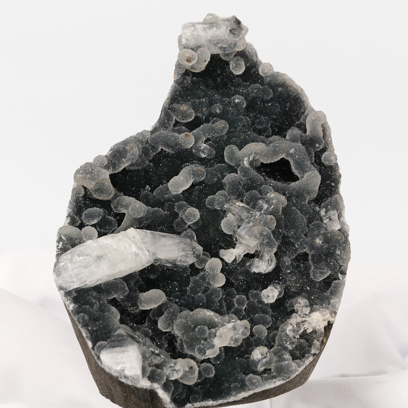 Botryoidal Apophyllite on Black Chalcedony Cutbase