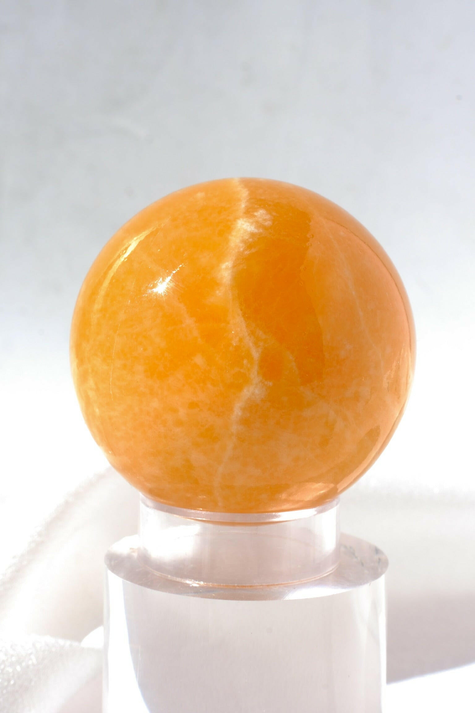 Mexican Orange Calcite Sphere Healing Crystal.