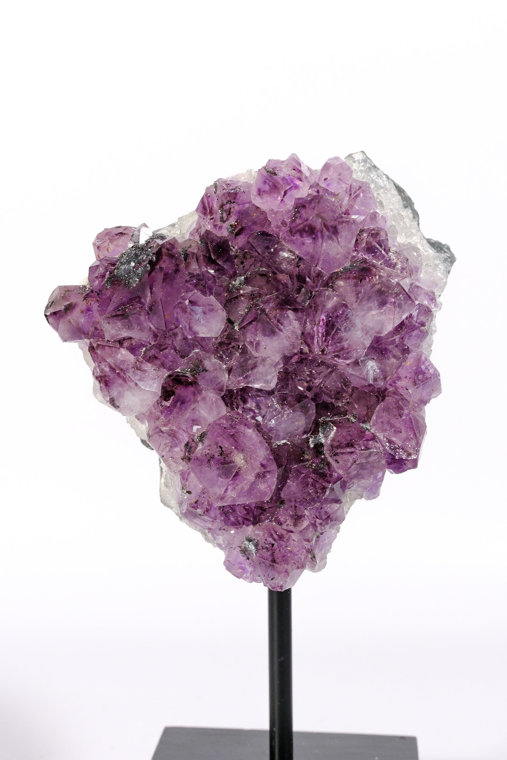 Amethyst Cluster with Hematite Inclusions on Stand