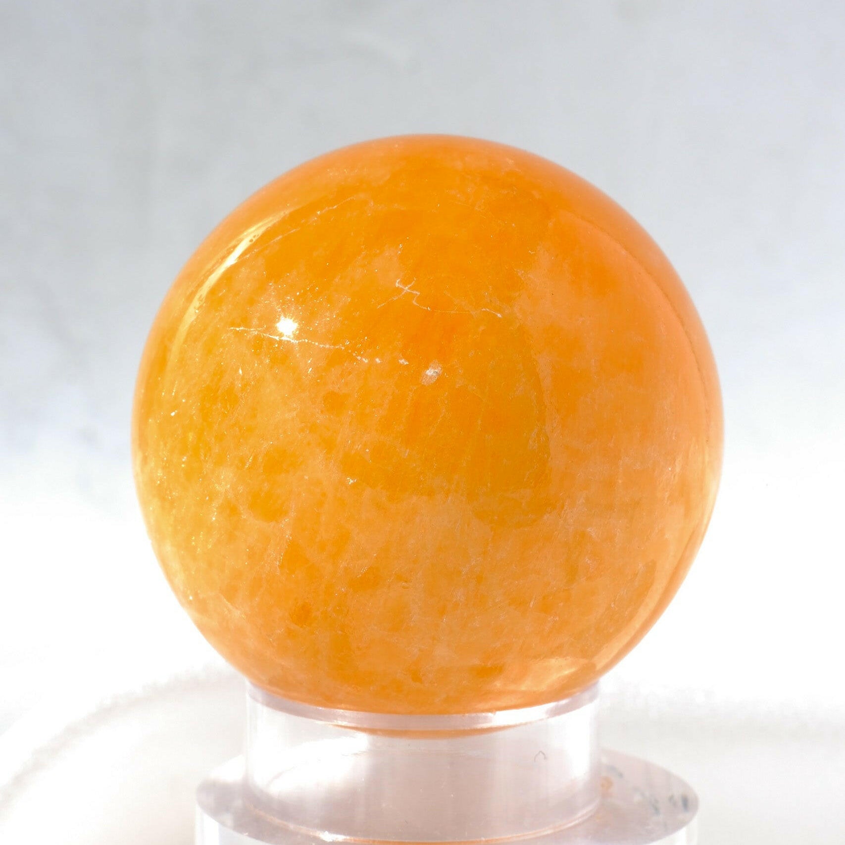 Mexican Orange Calcite Sphere Healing Crystal.