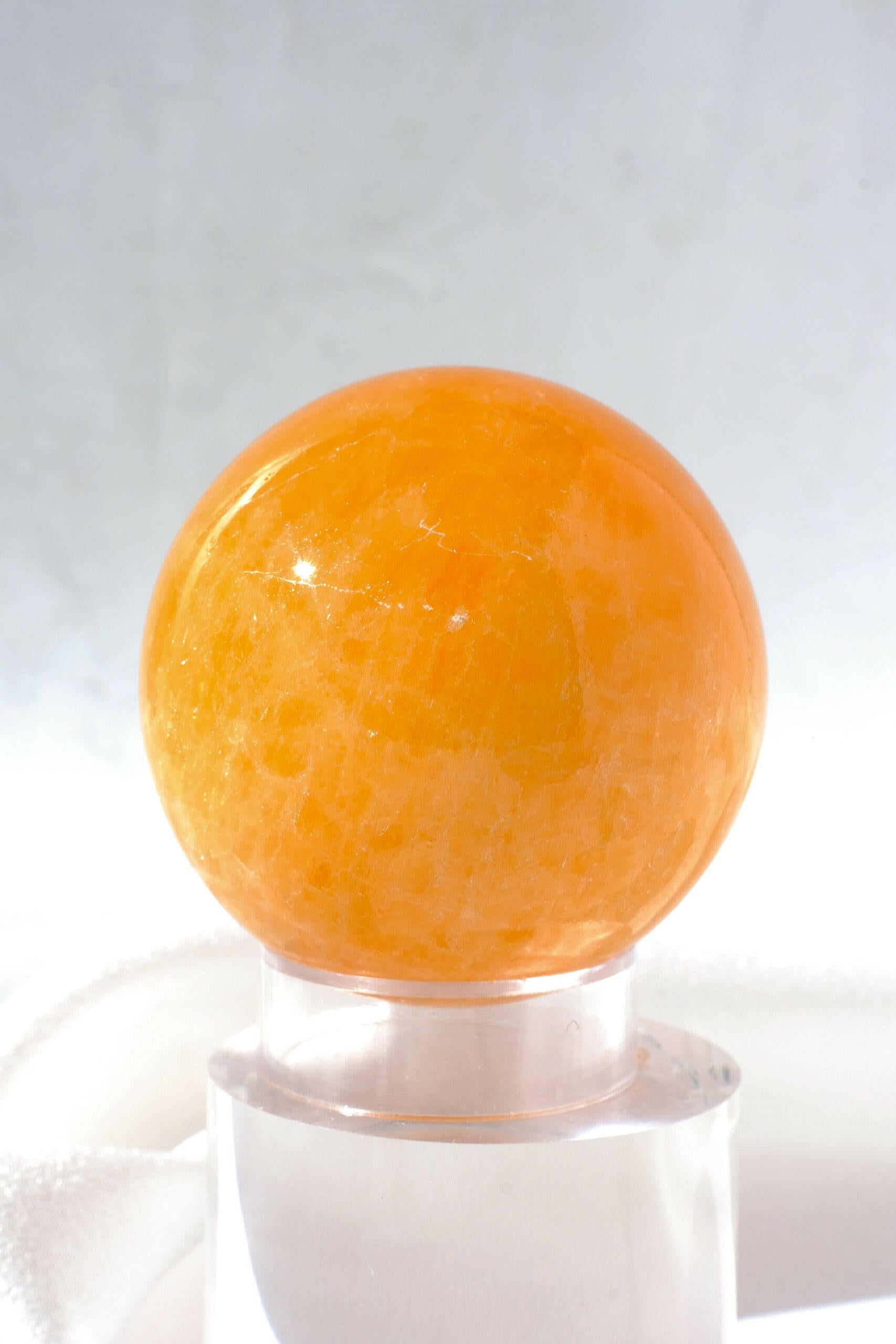 Mexican Orange Calcite Sphere Healing Crystal.