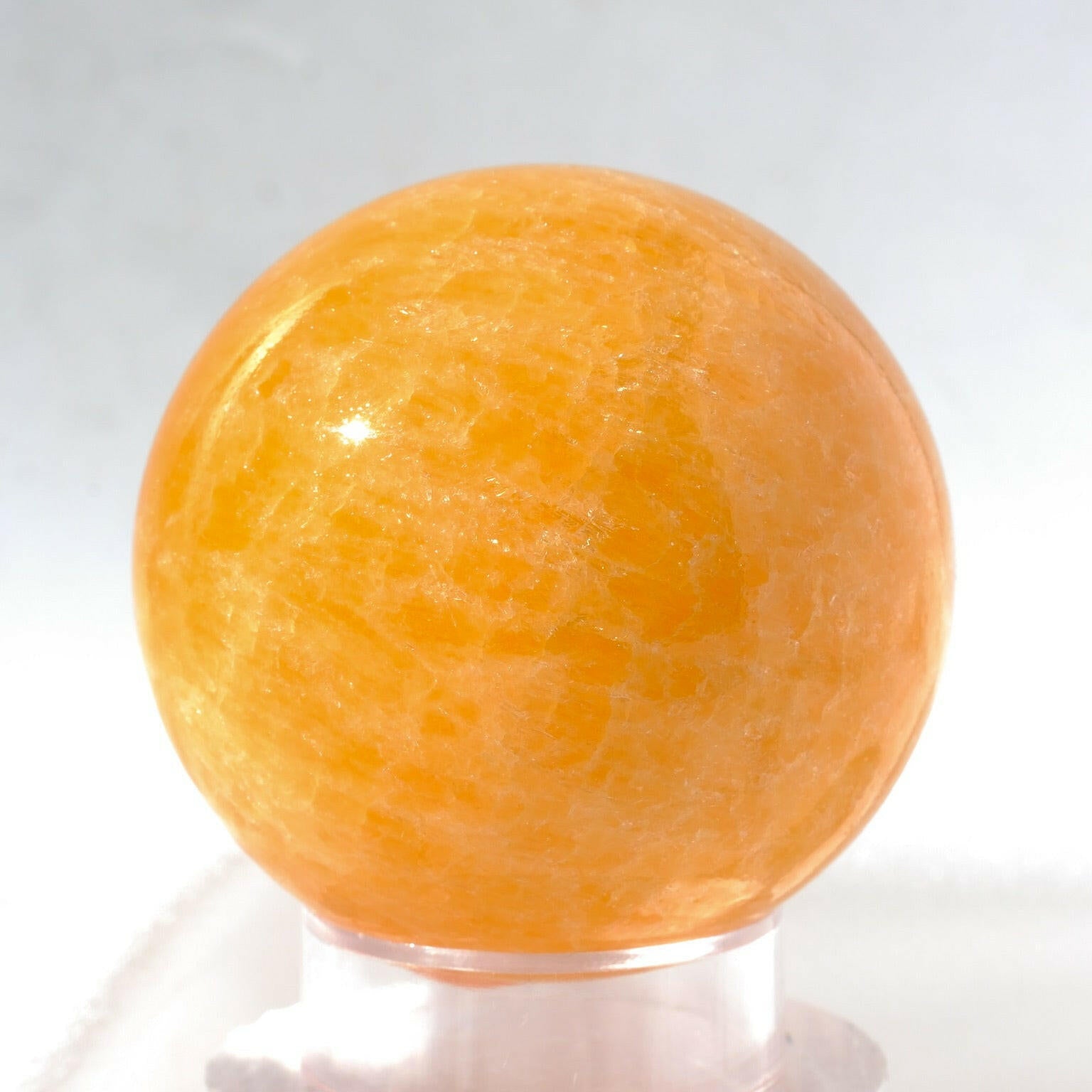 Mexican Orange Calcite Sphere Healing Crystal.