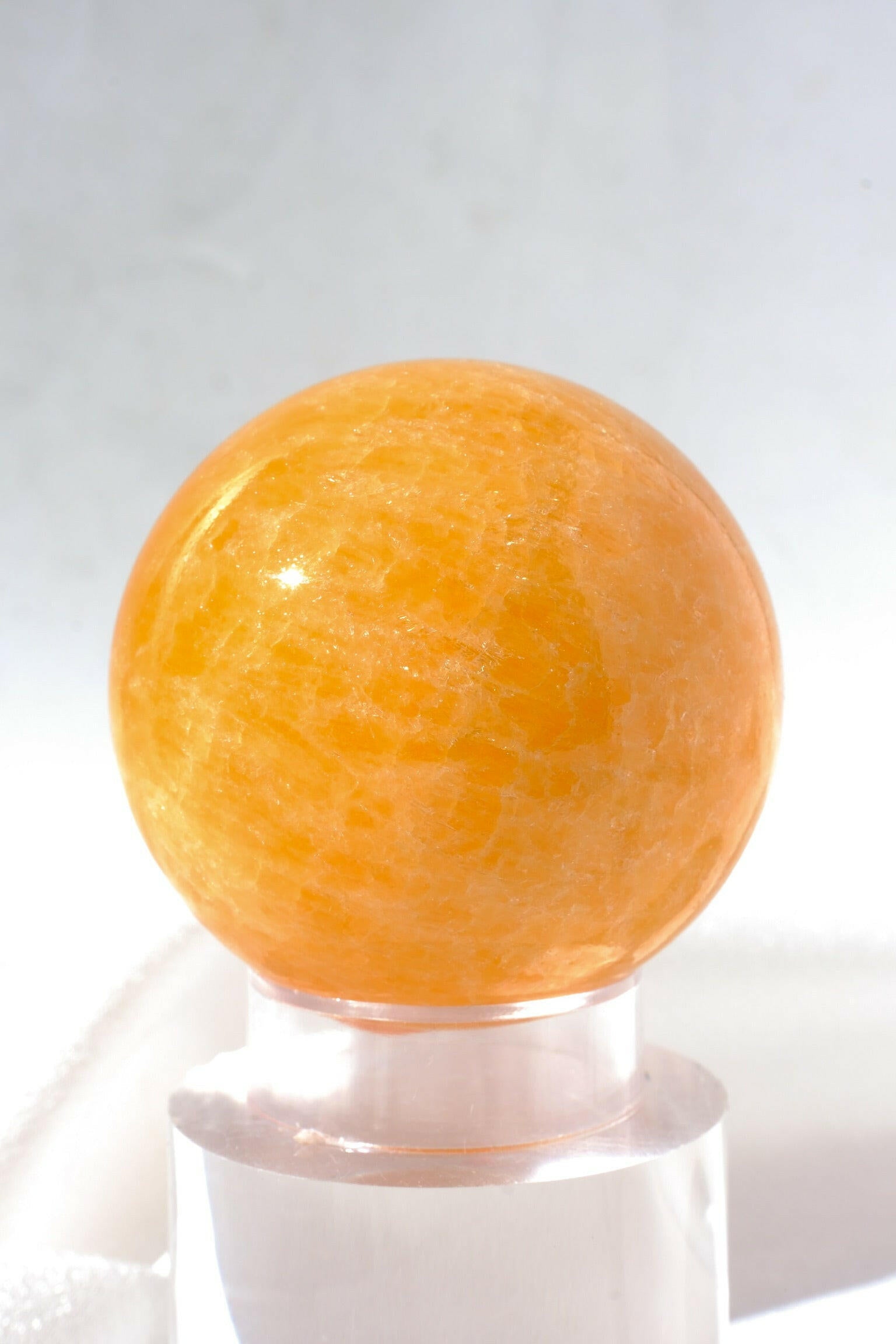 Mexican Orange Calcite Sphere Healing Crystal.