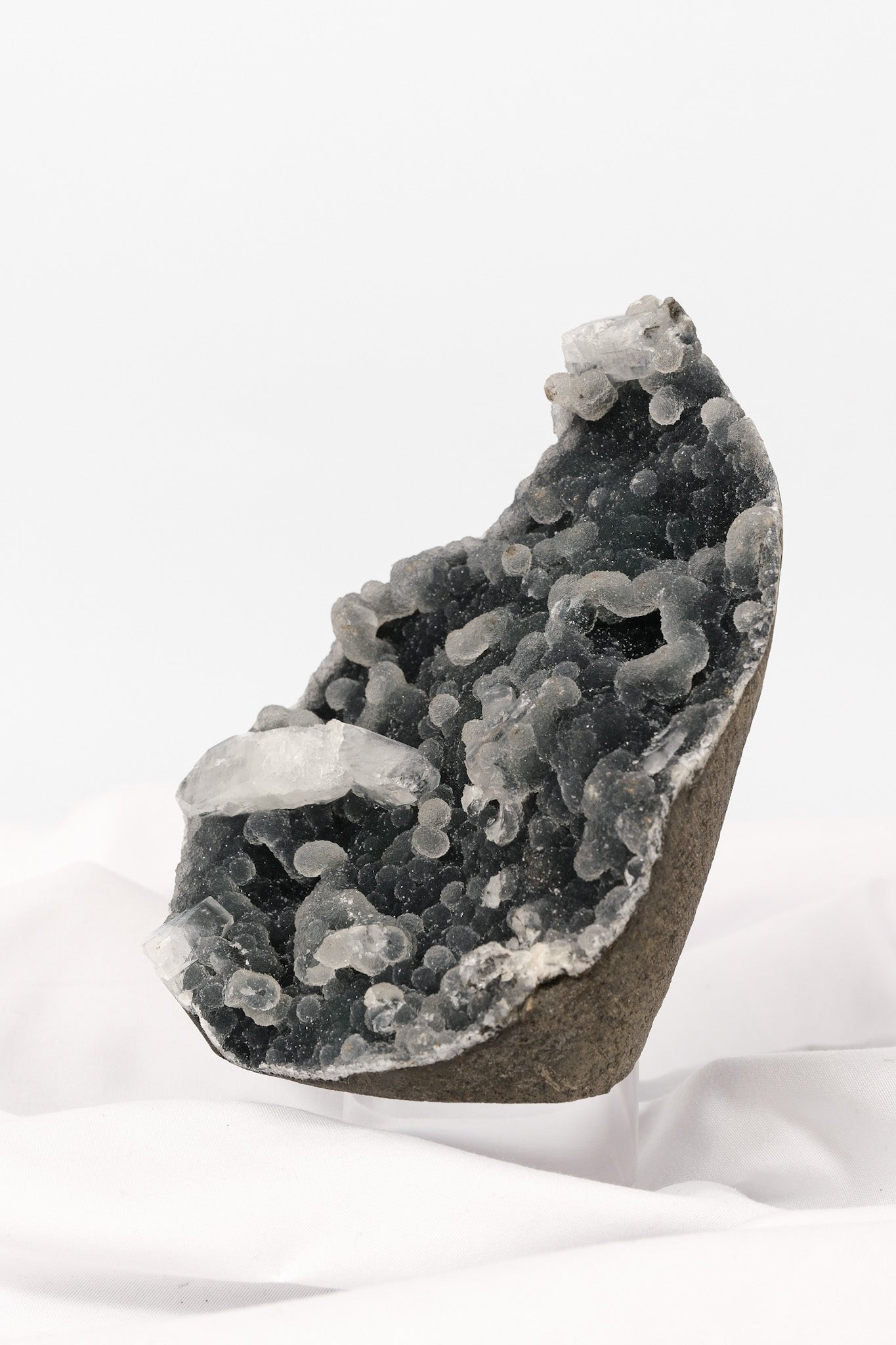 Botryoidal Apophyllite on Black Chalcedony Cutbase