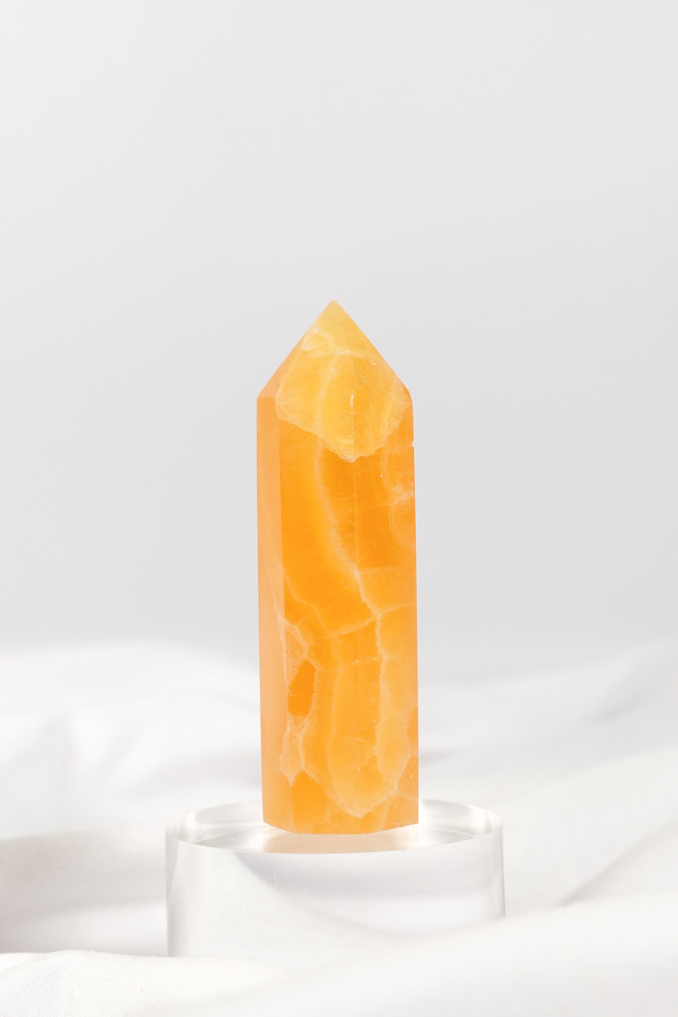Orange Calcite Tower - Misfit (chipped tip)