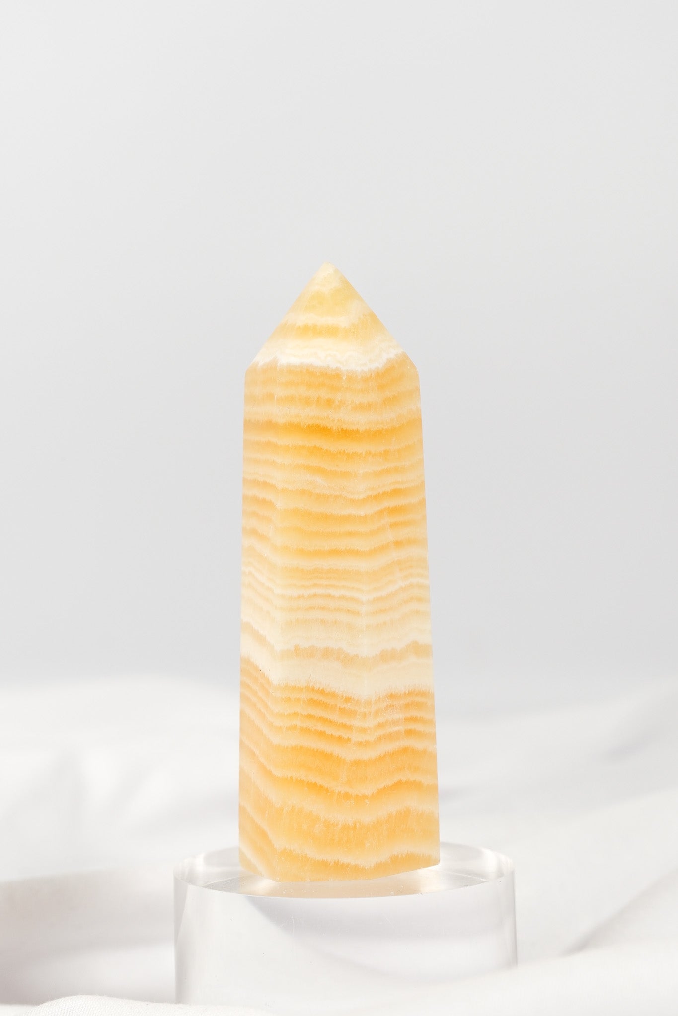 Orange Calcite Tower - Misfit (chipped tip)