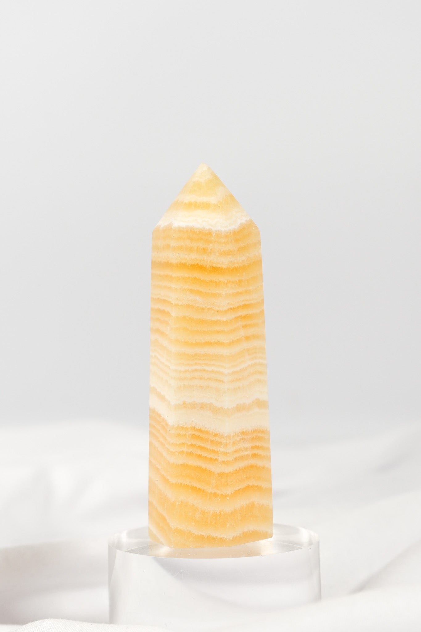 Orange Calcite Tower - Misfit (chipped tip)