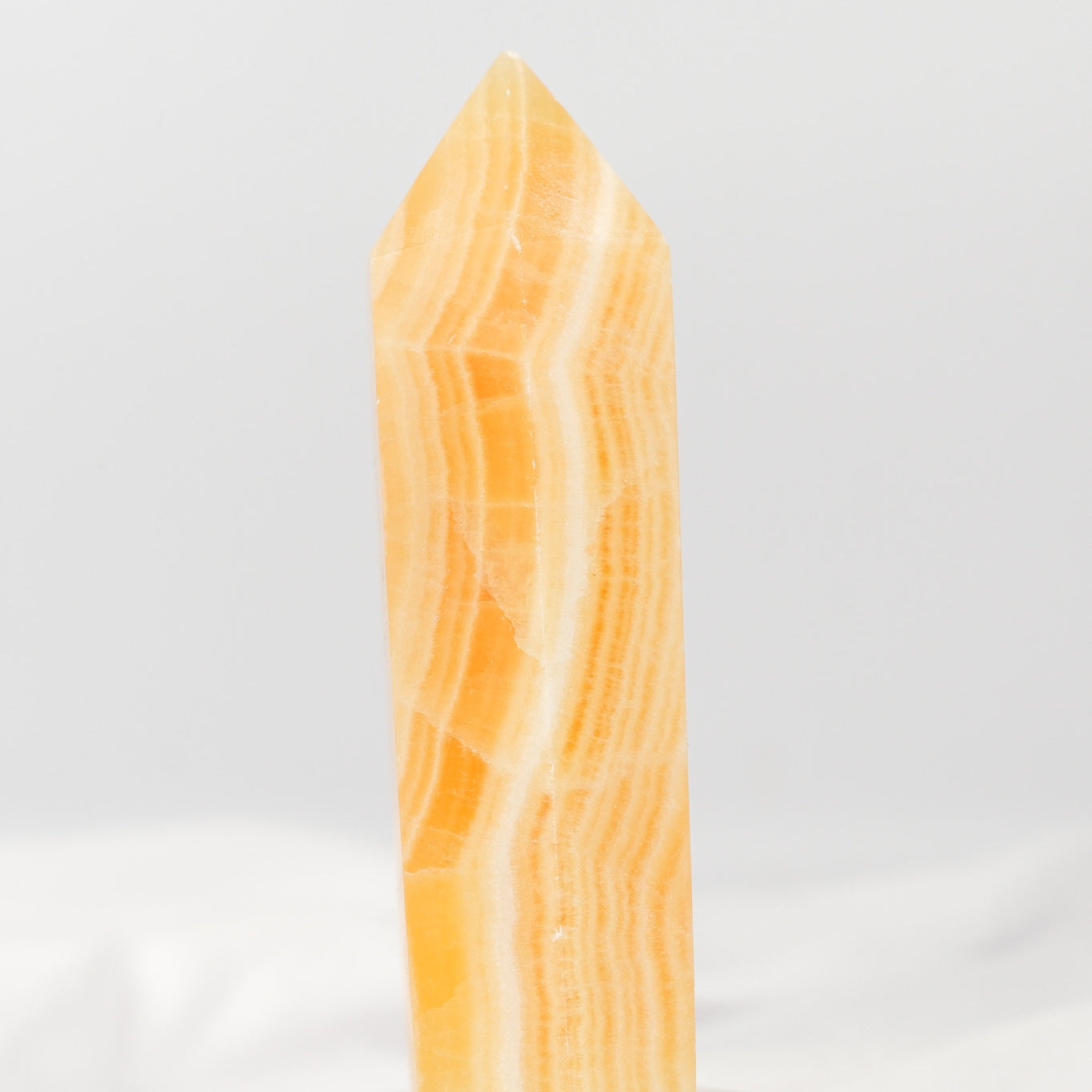 Orange Calcite Tower - Misfit (chipped tip)