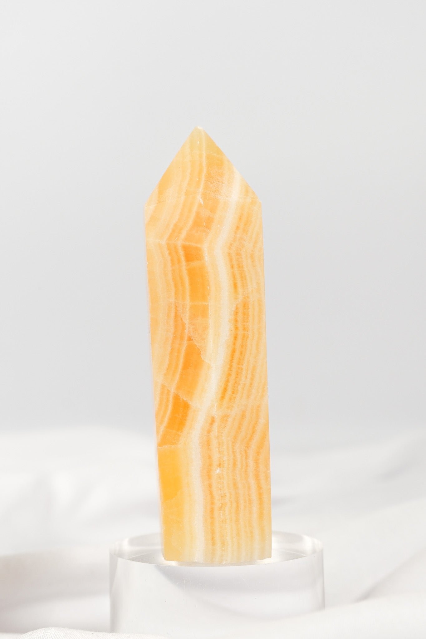 Orange Calcite Tower - Misfit (chipped tip)