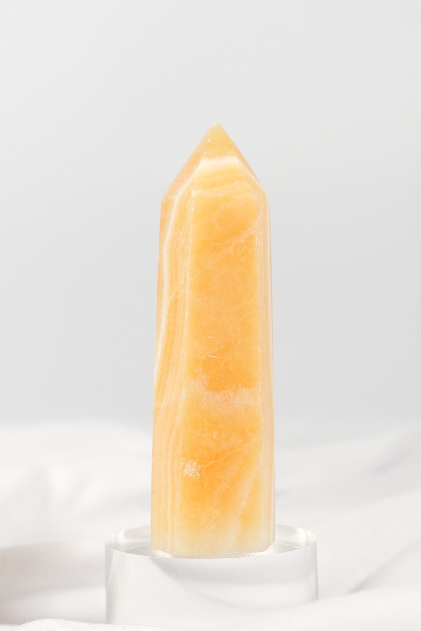 Orange Calcite Tower - Misfit (chipped tip)