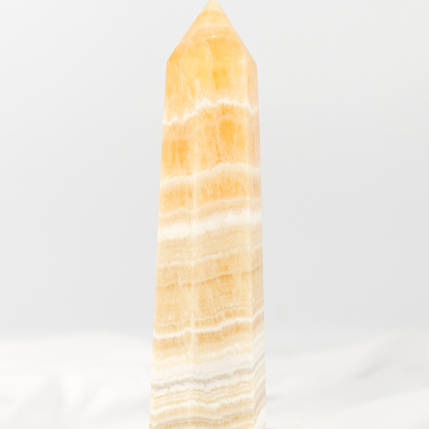 Orange Calcite Tower - Misfit (chipped tip)